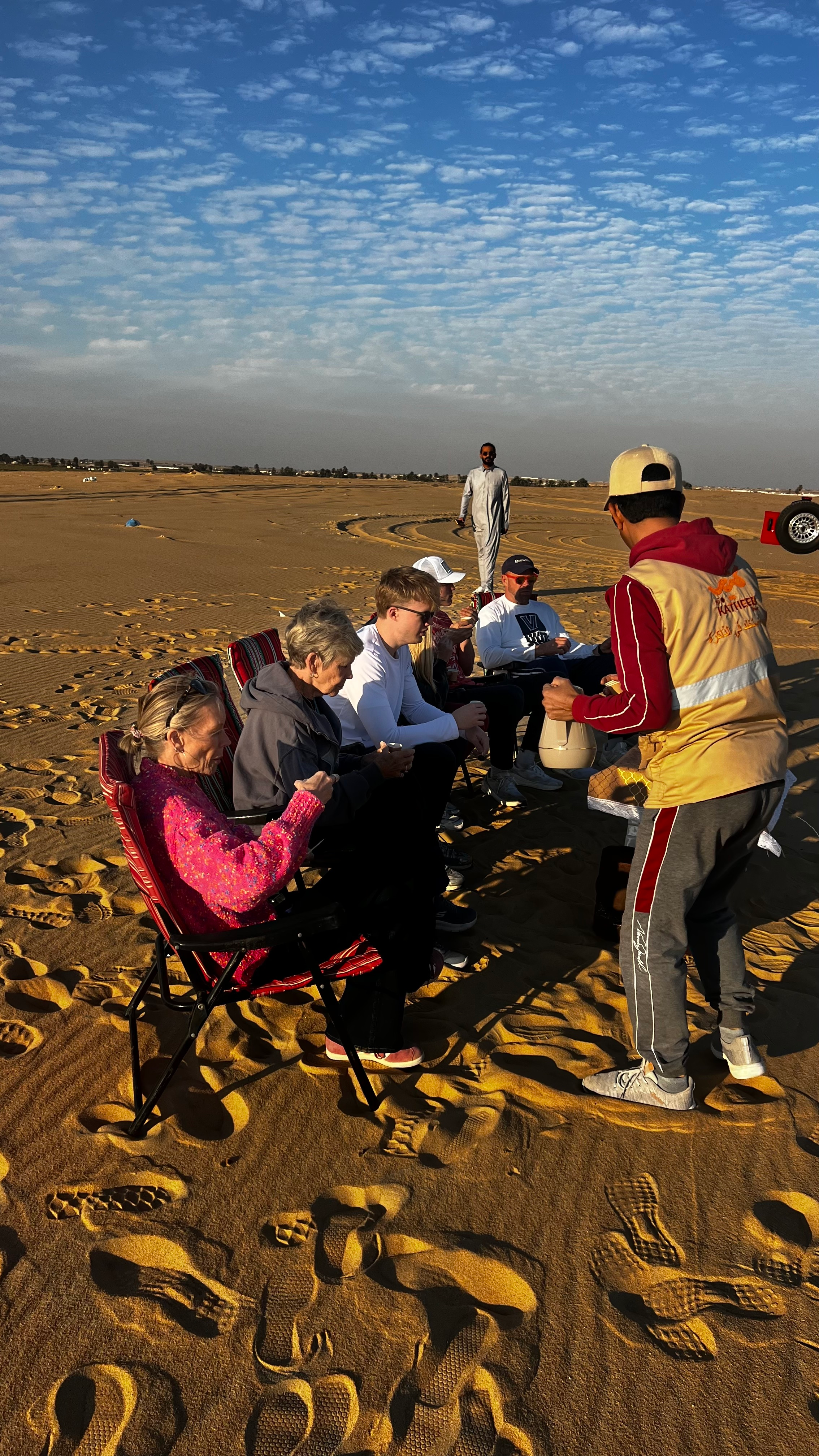 Sandboarding during a desert safari in Dammam